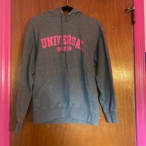Universla Studios gray hoodie with pink letters